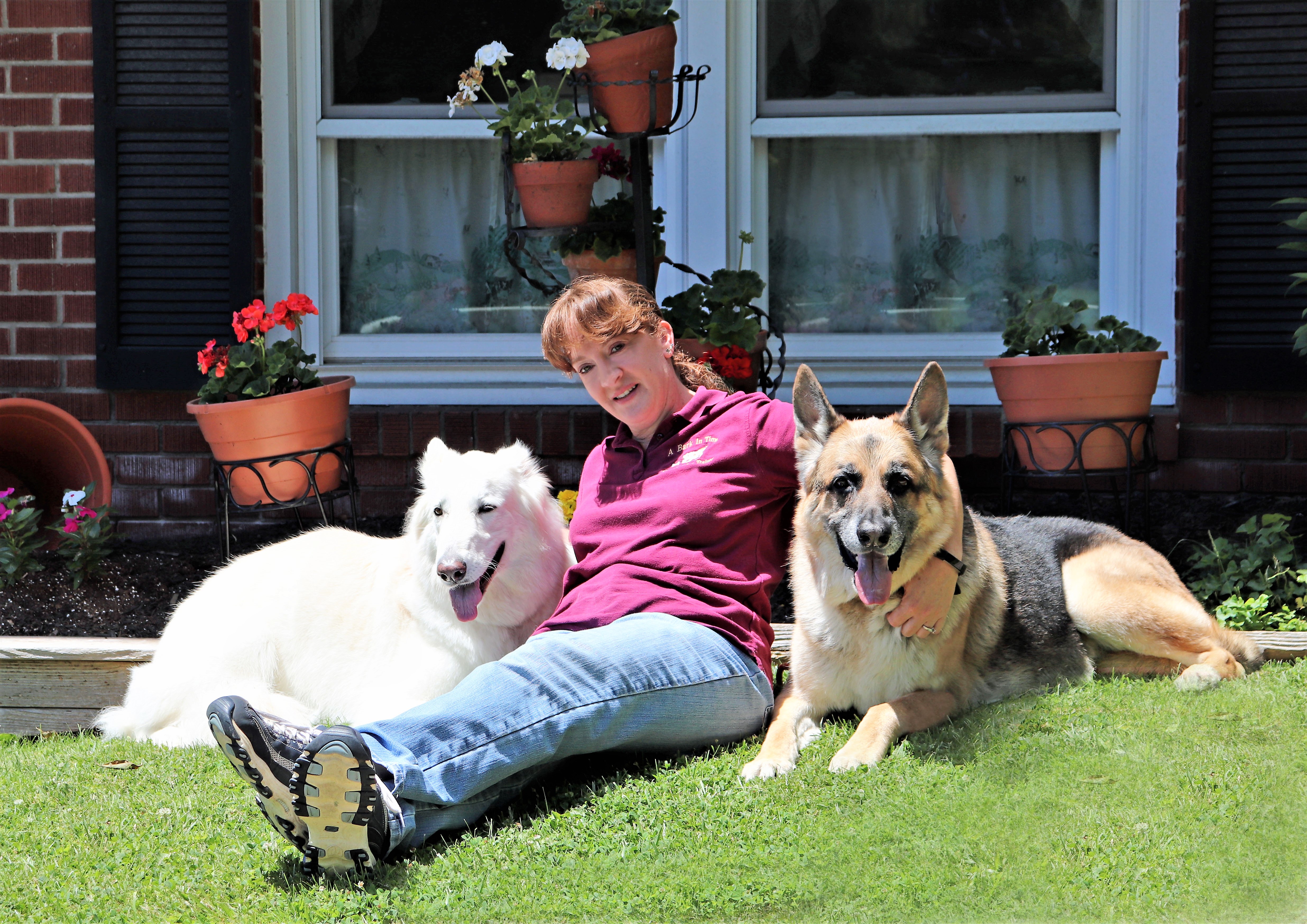 Carol sitting with the dogs